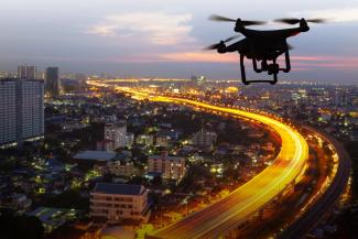 Drone flying over city